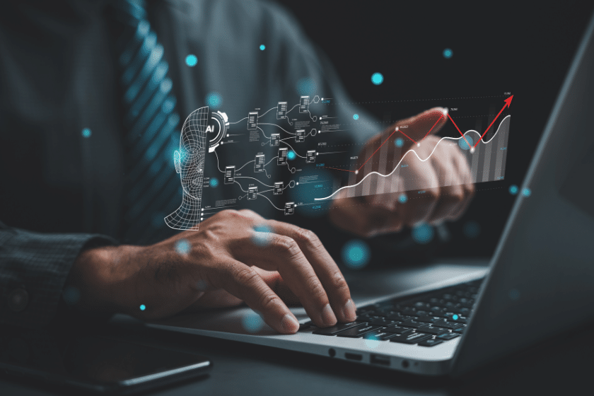 Persona al computer con grafici digitali e interfaccia AI per analisi e-commerce.