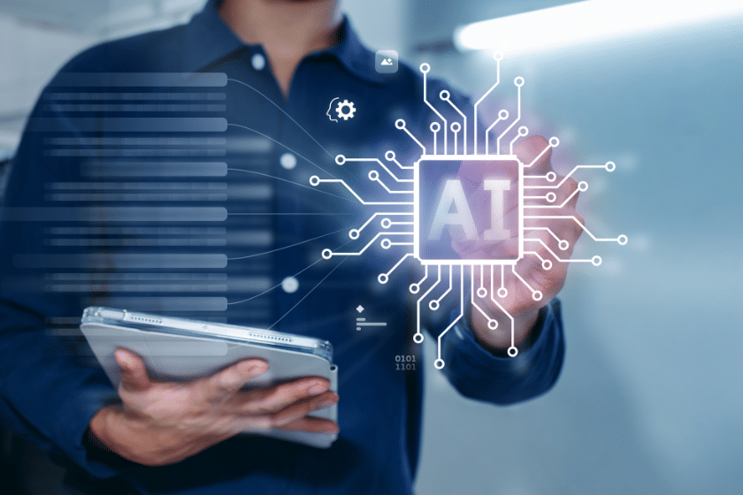 Persona con tablet davanti a interfaccia AI e flussi digitali.